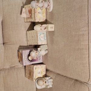 * 4 Precious Moments Figurines